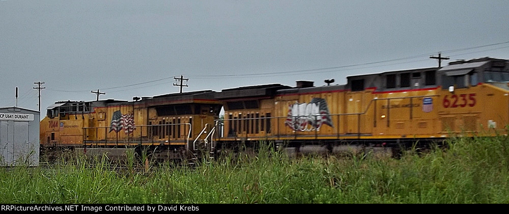 UP 6235 & 7044 2/3rs of a light engine move.